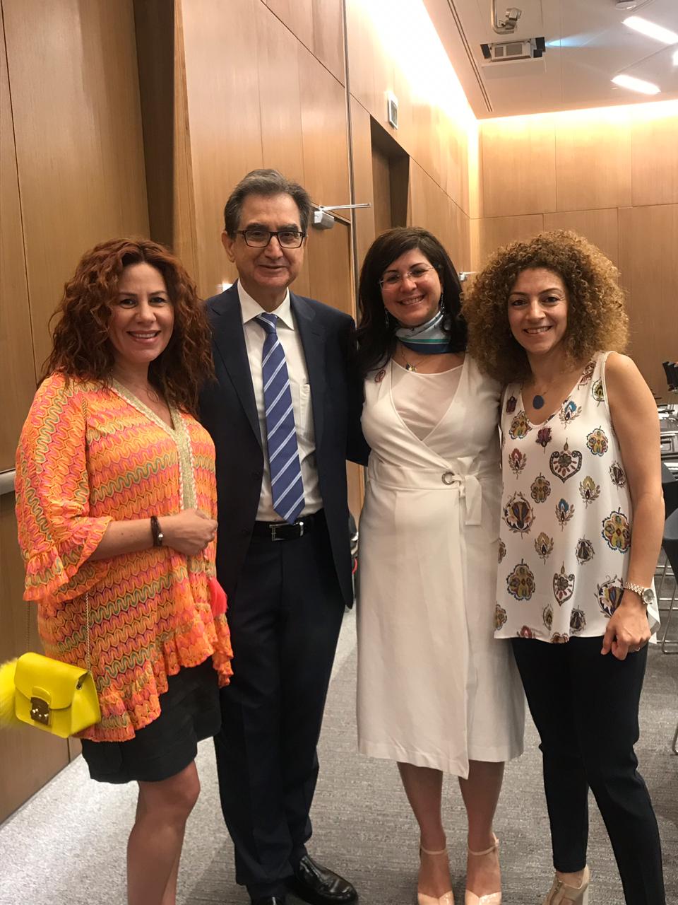 Man and three women standing