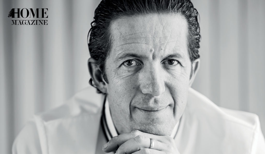 Black and white face portrait of a man with black hair