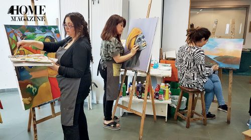 Three women painting